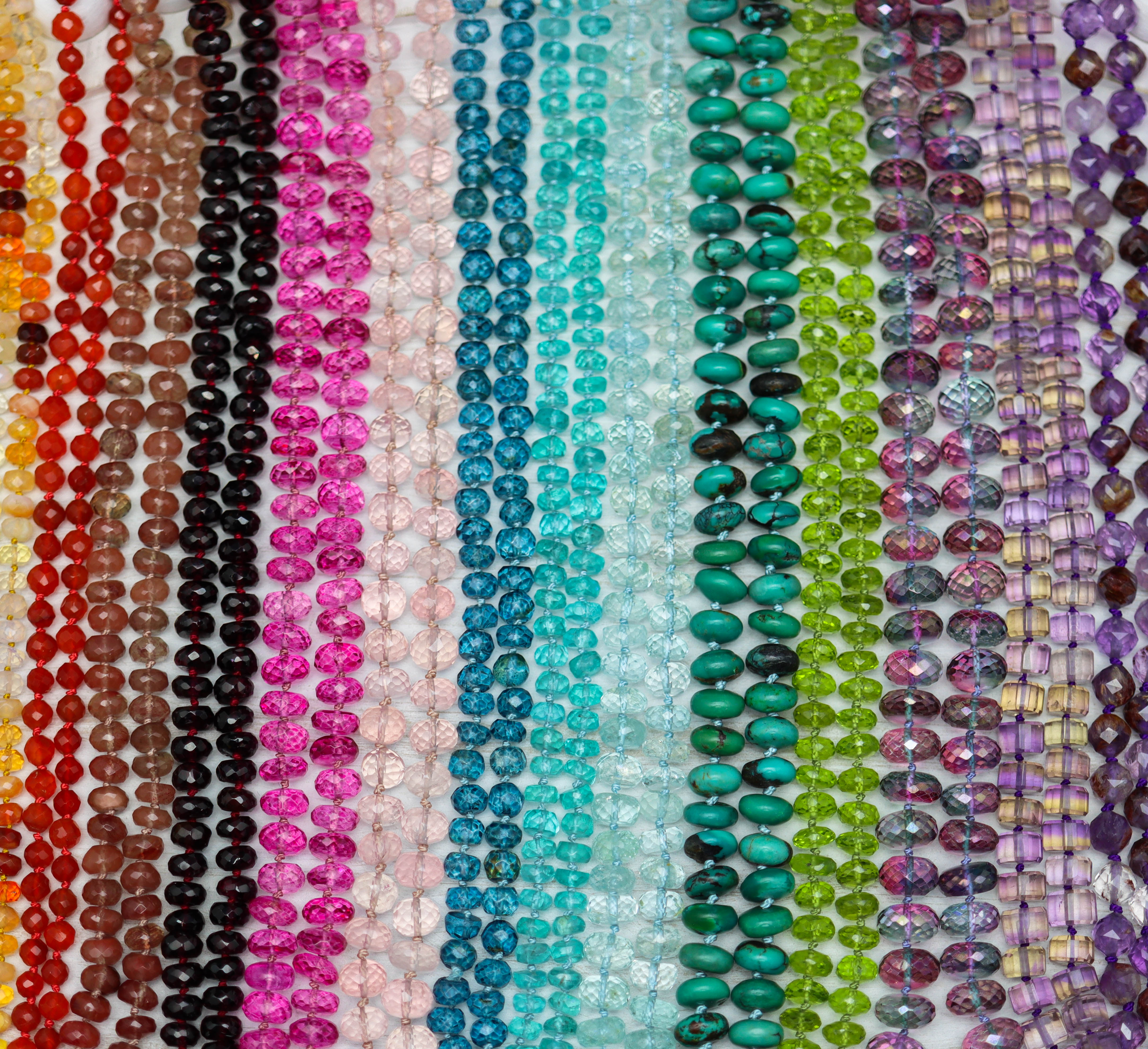 Hand Knotted Gemstone Strands on Silk