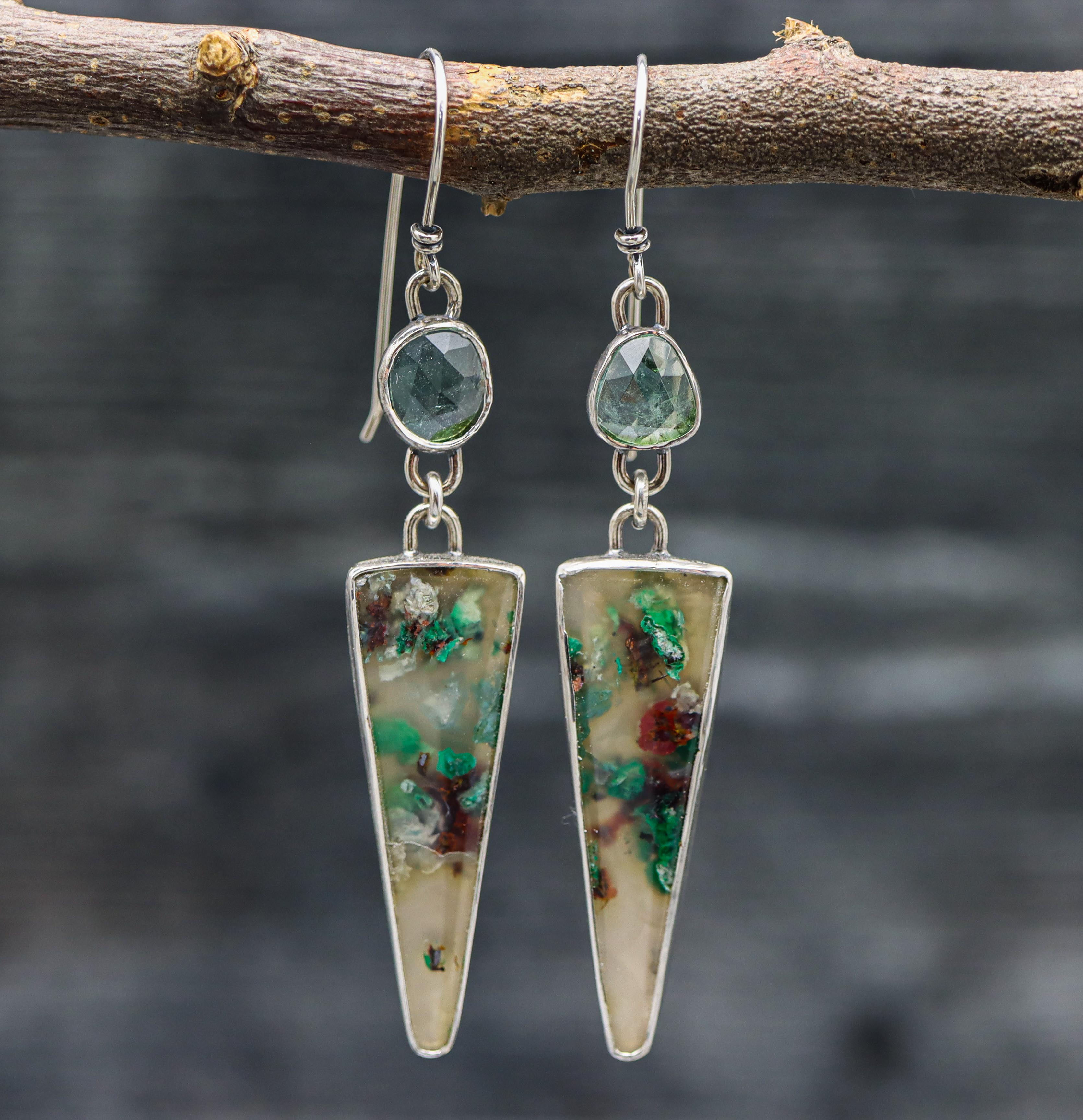 A pair of sterling silver dangle earrings with confetti chrysocolla stones and blue tourmaline accents.